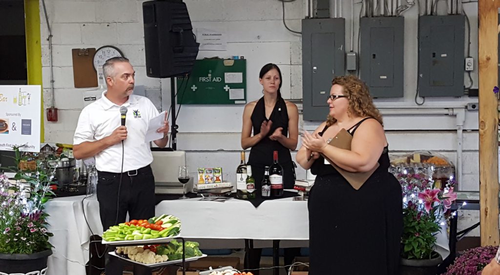 Photo Credit: Drew Hosick - Kevin Savoy and Robin Heald emceeing opening of Book Fair 2016