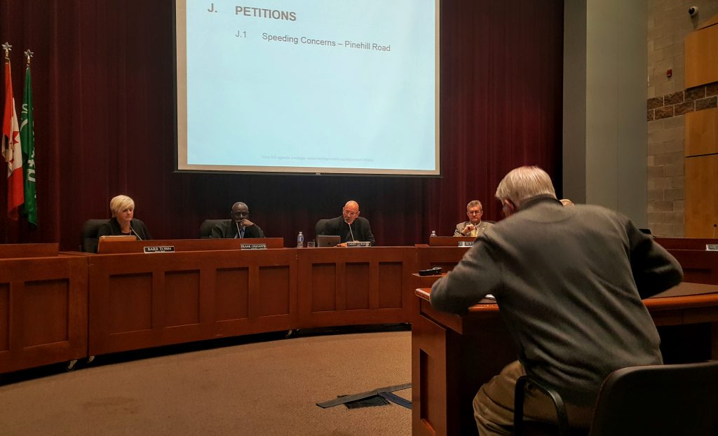 Photo Credit: Drew Hosick - Pinehill Road resident Al Sampson presents petition to NG Council