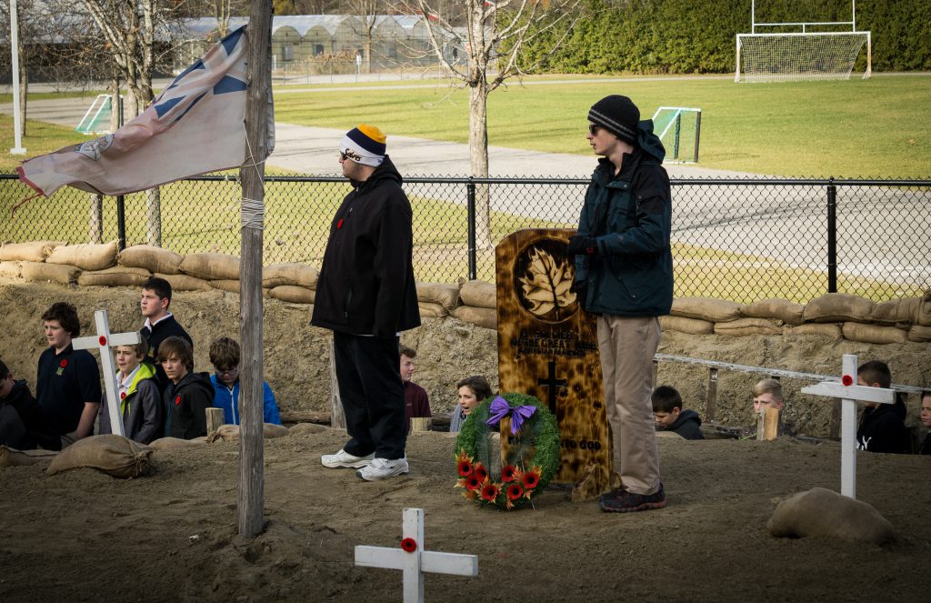 Photo Credit: Drew Hosick - Wreath being laid at St Michael Catholic High School ceremony