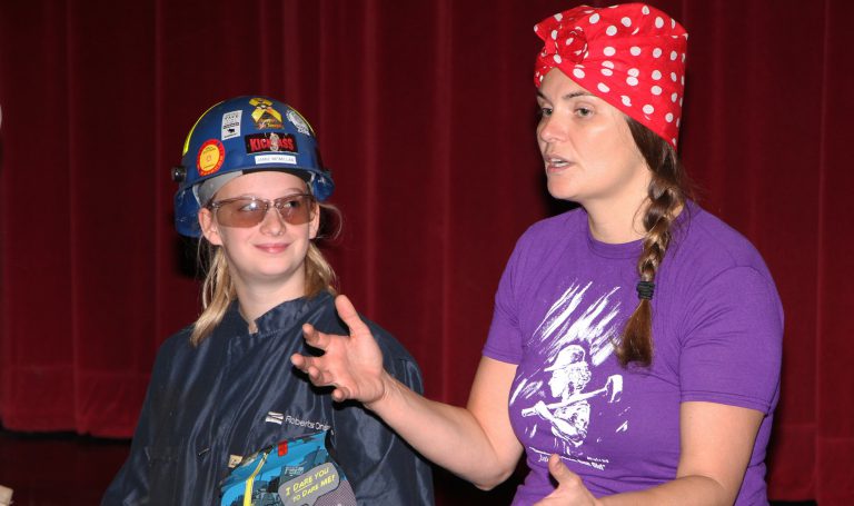 Over 500 young women crowd Municipal Centre for trades talk