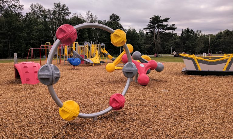Ribbon cutting for new accessible play structure set for tomorrow