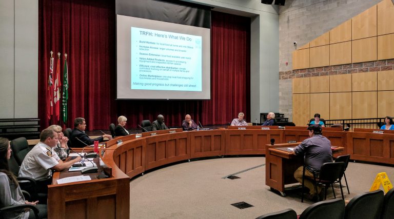 Bruce Enloe from Two Rivers Food Hub tells council about growth in local food industry