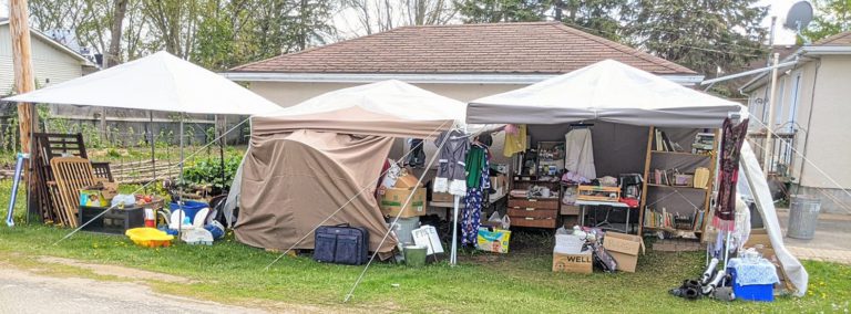 Take and Give Tent Encouraging Residents To Take What They Need